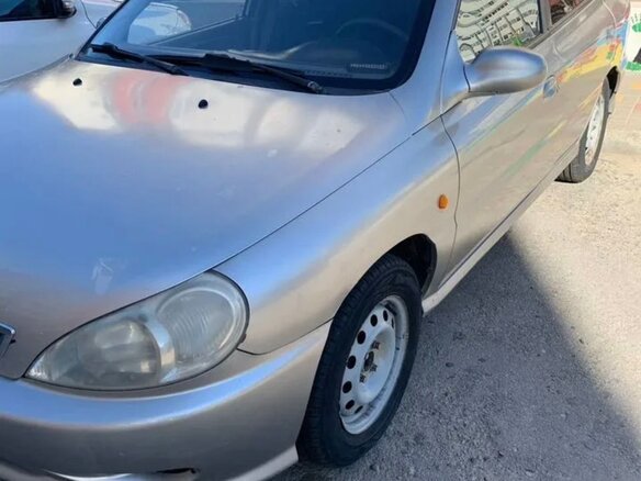 2001 Kia Rio I, серебристый, 230000 рублей