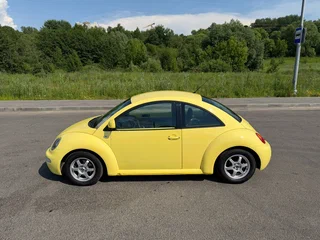 2001 Volkswagen Beetle I (A4), жёлтый, 430000 рублей, вид 2
