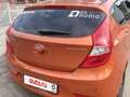 2015 Hyundai Solaris I Рестайлинг, оранжевый, 800000 рублей - вид 2
