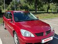 2007 Mitsubishi Lancer IX Рестайлинг, красный - вид 2