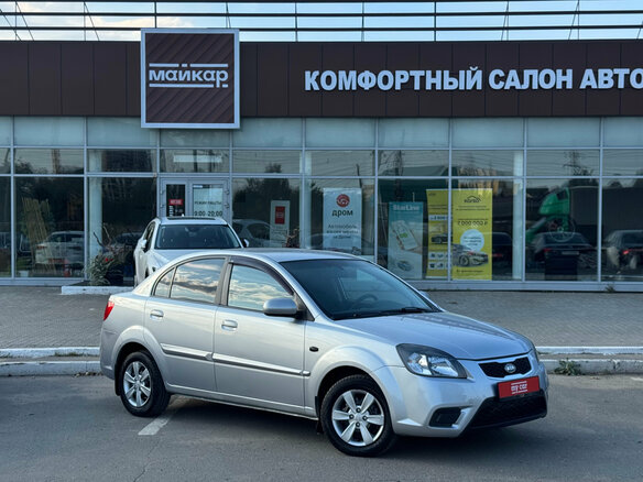 2011 Kia Rio II Рестайлинг, серебристый - вид 2
