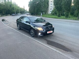2008 Toyota Corolla AMT X (E140, E150), чёрный, 650000 рублей, вид 1