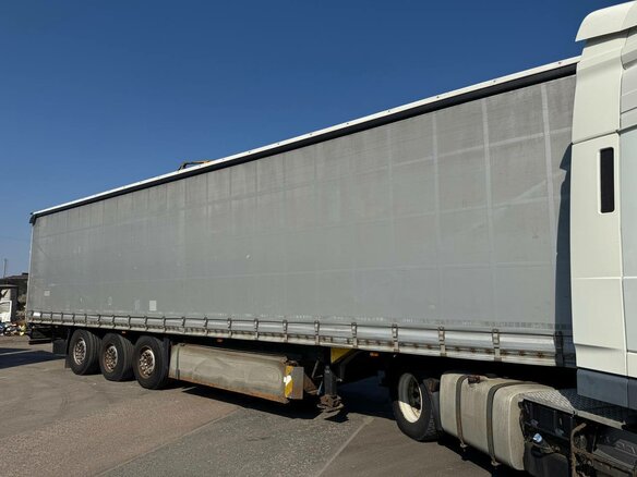 2013 Schmitz Cargobull SCS, серебристый, 1700000 рублей - вид 2