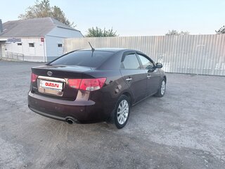 2011 Kia Cerato 6-speed II, пурпурный, 980000 рублей, вид 3