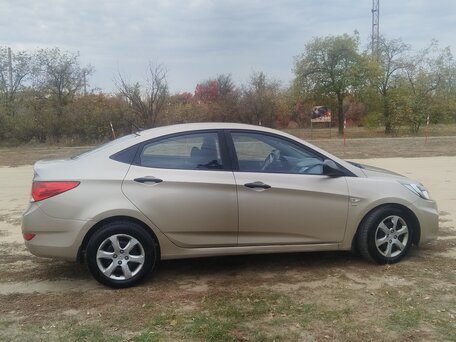 2011 Hyundai Solaris I, бежевый, 593000 рублей, вид 3