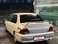 2001 Mitsubishi Lancer Cedia IX, белый - вид 2