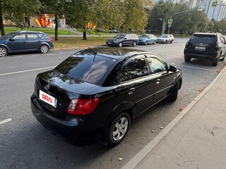 2010 Kia Rio II Рестайлинг, чёрный, 620000 рублей, вид 2