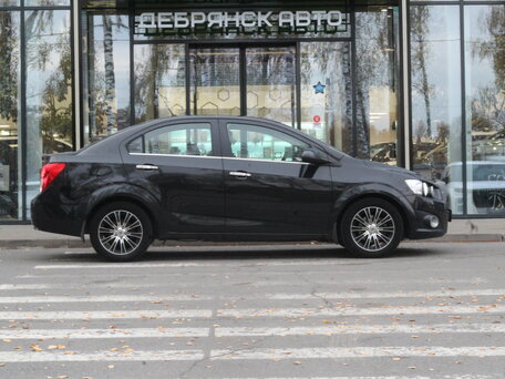 2012 Chevrolet Aveo II, чёрный, 650000 рублей, вид 4