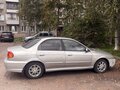 2005 Kia Spectra I Рестайлинг 2, серебристый, 200000 рублей - вид 6