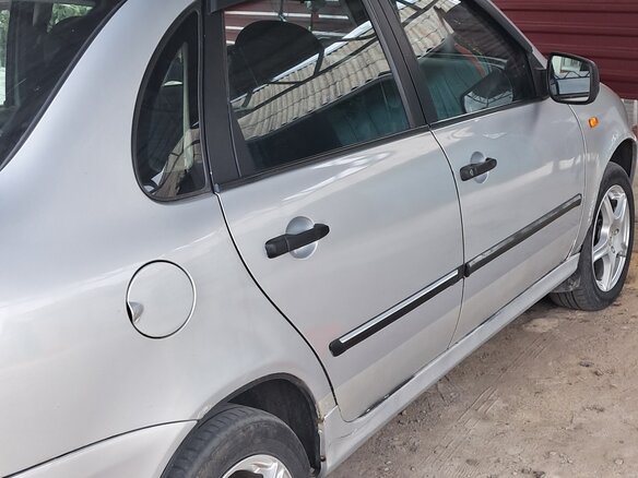2009 Lada (ВАЗ) Kalina I, серебристый - вид 2