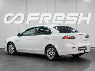 2012 Mitsubishi Lancer X Рестайлинг, белый, 899000 рублей, вид 2
