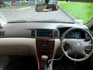 2003 Toyota Corolla IX (E120, E130), серебристый, 850000 рублей, вид 5