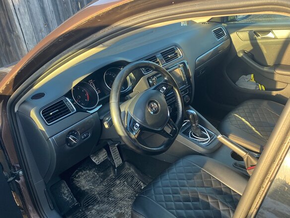 2016 Volkswagen Jetta VI Рестайлинг, коричневый, 850000 рублей - вид 6