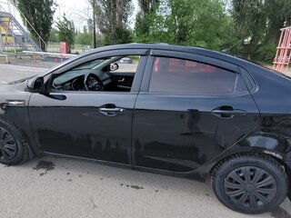 2013 Kia Rio 4-speed III, чёрный, 530000 рублей, вид 4