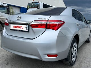 2013 Toyota Corolla XI (E160, E170, E180), серебристый, 1340000 рублей, вид 4