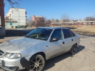 2009 Daewoo Nexia I Рестайлинг, серебристый, 230000 рублей, вид 1