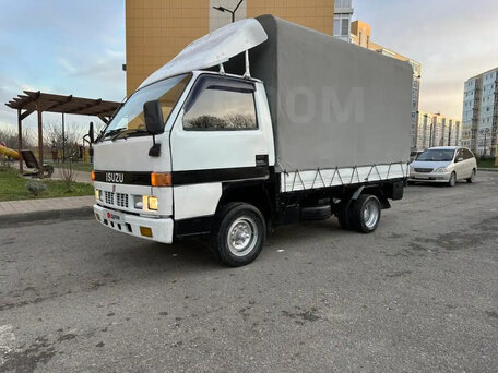 1987 Isuzu Elf (N-series), белый, 600000 рублей, вид 1
