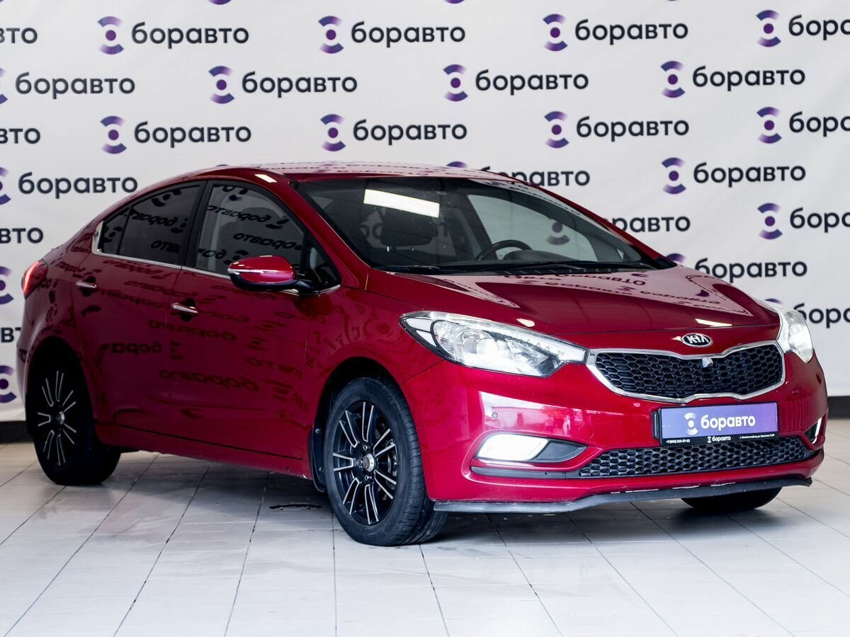 Открыть фотографии: Kia Cerato III