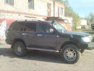 2004 Toyota Land Cruiser 105 100 Series Рестайлинг 1, серый, 2000000 рублей, вид 2