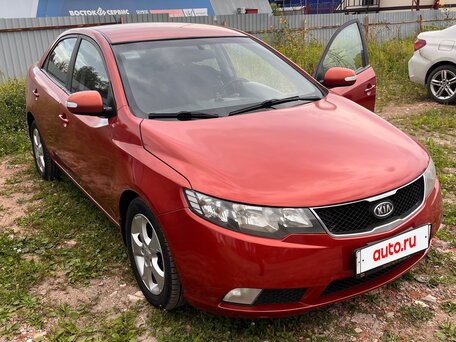2009 Kia Cerato 5-speed II, оранжевый, 495000 рублей, вид 1