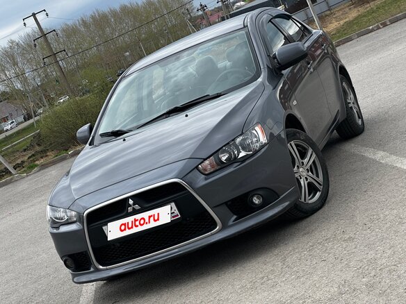 2011 Mitsubishi Lancer X Рестайлинг, серый, 900000 рублей - вид 1