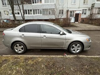 2013 Mitsubishi Lancer X Рестайлинг, серебристый, 799900 рублей, вид 5