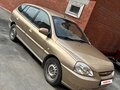2004 Kia Rio I Рестайлинг, бежевый - вид 1