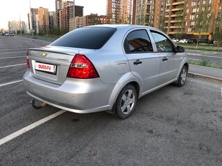 2011 Chevrolet Aveo I Рестайлинг, серебристый, 345000 рублей, вид 4
