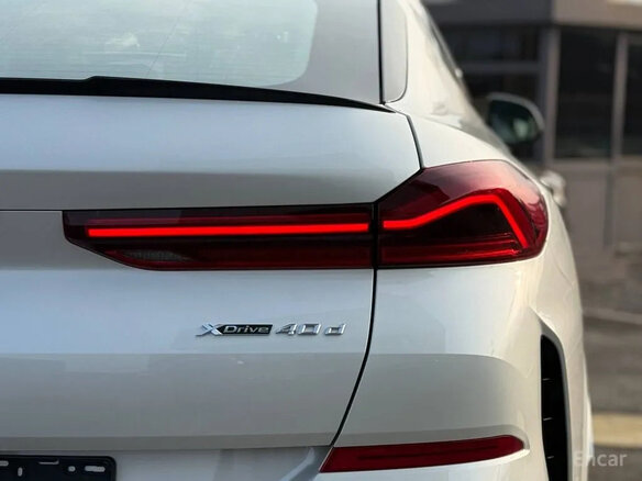 2026 BMW X6 40d III (G06) Рестайлинг, белый - вид 6