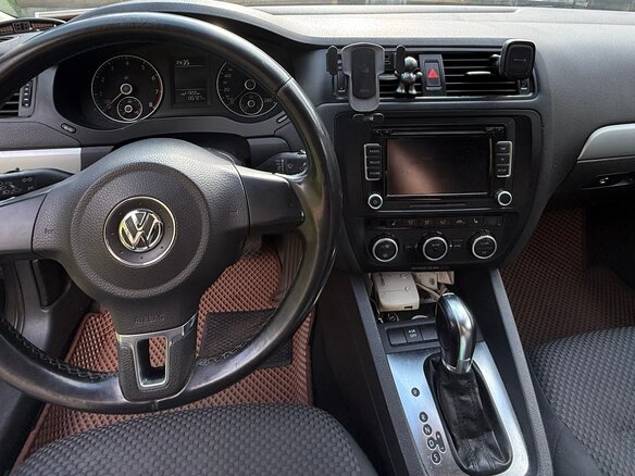 2012 Volkswagen Jetta VI, коричневый, 920000 рублей - вид 4