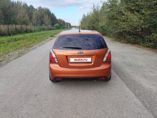 2011 Kia Rio II Рестайлинг, оранжевый, 600000 рублей, вид 5