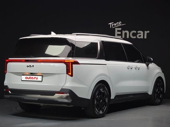 2024 Kia Carnival IV Рестайлинг, белый - вид 1