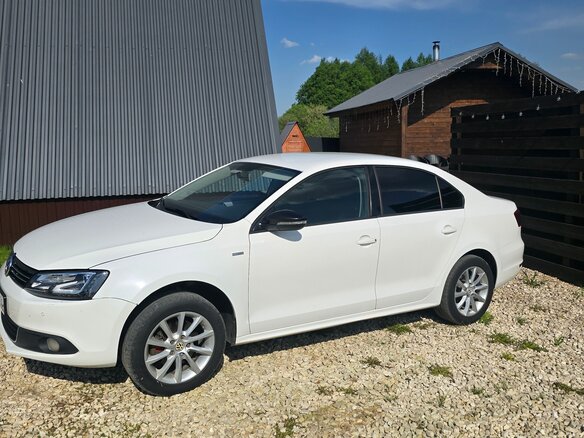 2013 Volkswagen Jetta VI, белый - вид 4