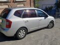 2011 Kia Carens II (UN), серебристый - вид 2