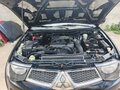 2011 Mitsubishi L200 IV, чёрный - вид 8