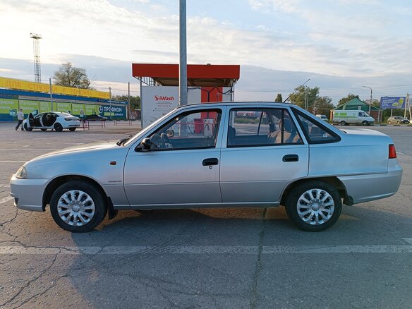 2011 Daewoo Nexia I Рестайлинг, серебристый, 235000 рублей - вид 5