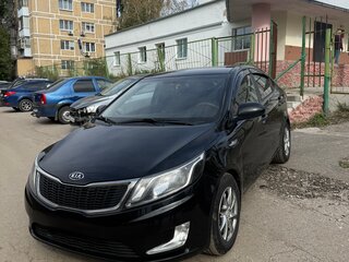 2012 Kia Rio 4-speed III, чёрный, 880000 рублей, вид 1