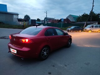 2007 Mitsubishi Lancer X, красный, 595000 рублей, вид 3