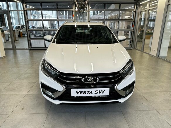2026 Lada (ВАЗ) Vesta SW I Рестайлинг (NG), белый, 1915000 рублей - вид 1