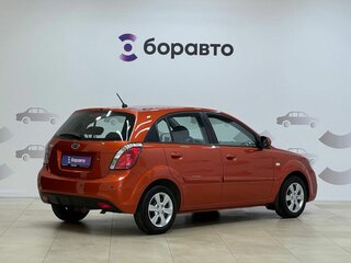 2010 Kia Rio II Рестайлинг, оранжевый, 790000 рублей, вид 4