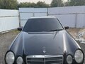 1996 Mercedes-Benz E-Класс 230 II (W210, S210), чёрный - вид 4