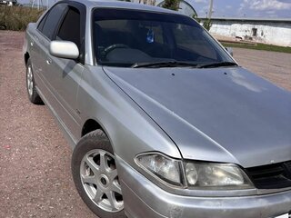 1999 Toyota Carina VII (T210), серый, 430000 рублей, вид 1