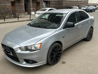 2011 Mitsubishi Lancer X Рестайлинг, серебристый, 570000 рублей, вид 1
