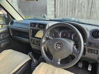 2010 Suzuki Jimny Kei car III Рестайлинг 1, серый, 650000 рублей, вид 4