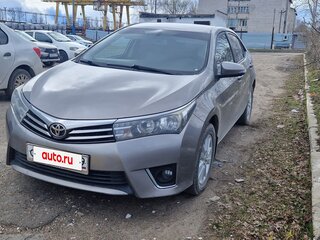 2013 Toyota Corolla XI (E160, E170, E180), золотистый, 880000 рублей, вид 1