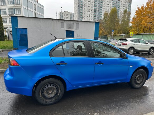 2010 Mitsubishi Lancer X, синий - вид 7