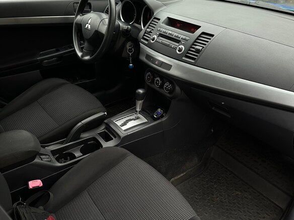 2010 Mitsubishi Lancer X, синий - вид 10