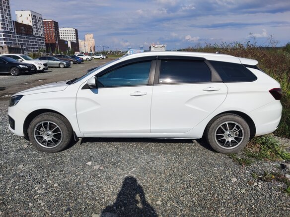 2023 Lada (ВАЗ) Vesta SW I Рестайлинг (NG), белый - вид 3