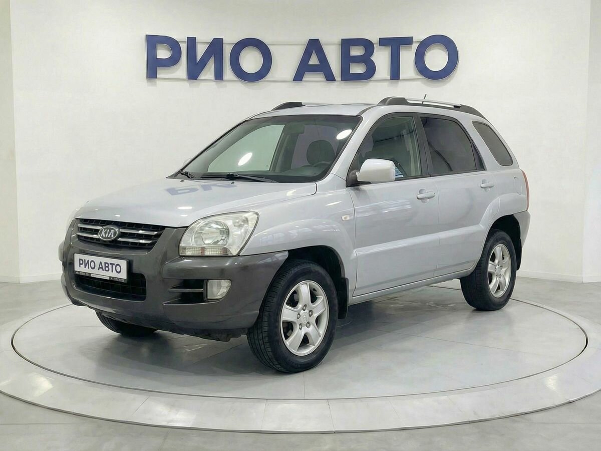 Открыть фотографии: Kia Sportage II
