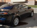 2012 Mitsubishi Lancer X Рестайлинг, чёрный, 1050000 рублей - вид 7
